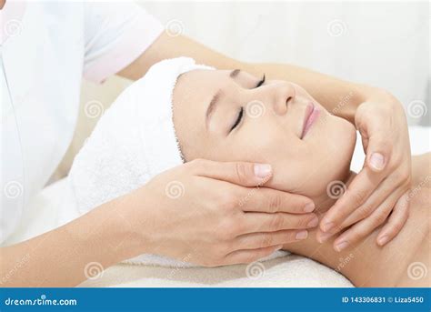 Beautiful Young Woman Receiving Facial Massage Stock Image Image Of Female Massage 143306831