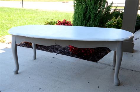 The piece is not marked. The Painted Perch: Gray and White Coffee Table