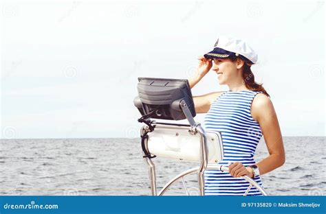 Beautiful Attractive Sailor Girl Driving A Boat Sea Navigation