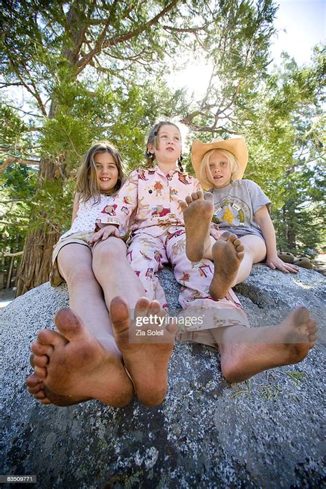 Summer Camping 3 Girls With Dirty Feet Photo Getty Images