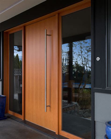 These 13 Sophisticated Modern Wood Door Designs Add A Warm Welcome