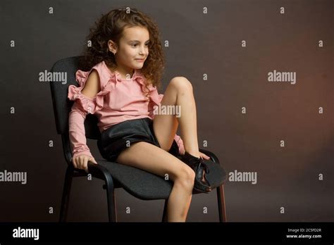 Beautiful Little Girl Sitting Legs Fotos Und Bildmaterial In Hoher