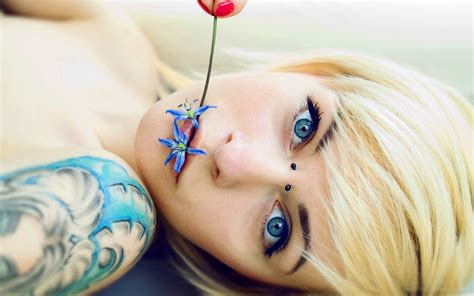 Women Tattoos Blonde Blue Eyes Tattoos Women Piercing Flower In Mouth Flowers Piercing Eyes