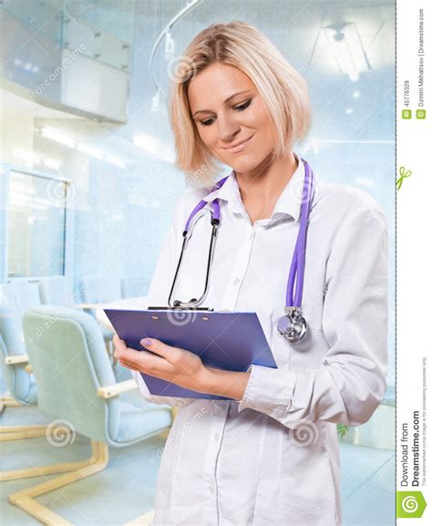 Female Doctor Clipboard And Writing In It Stock Image Image Of
