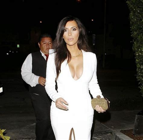 Kim Kardashian Cleavage In Low Cut Tight White Dress Arriving At