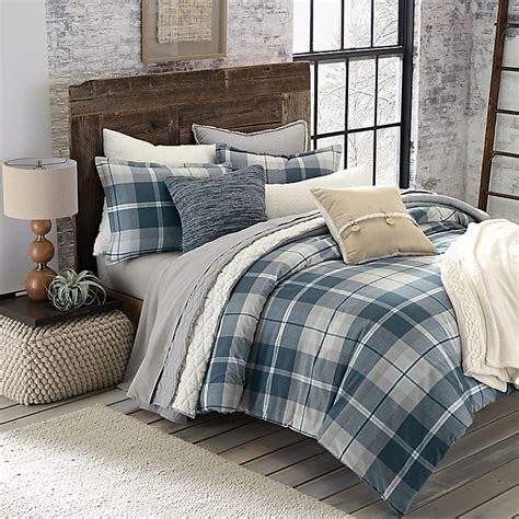 That is what we thought too! UGG® Monterey Plaid Chambray Reversible Comforter Set ...