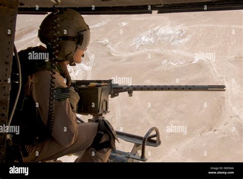 A Us Marine Corps Door Gunner Scans Landscape South Haditha Iraq Behind