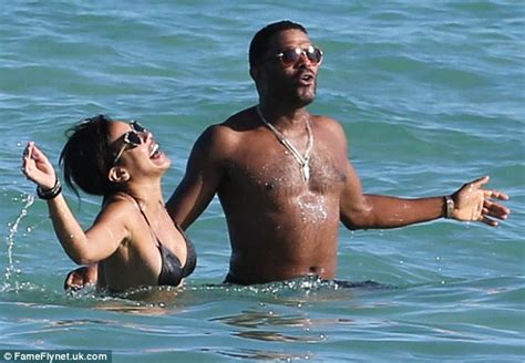 Maxwell Shows Off Impressive Torso As He Hits Beach With Bikini Clad