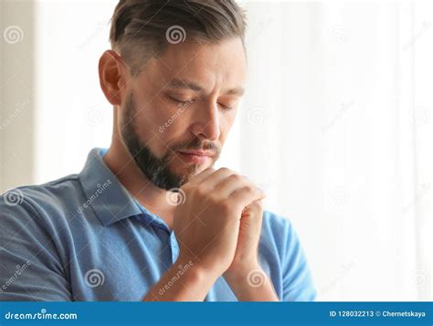 Man With Hands Clasped Together For Prayer Stock Image Image Of Holy
