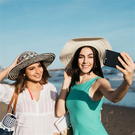 Free Photo Women Taking Selfie At The Beach
