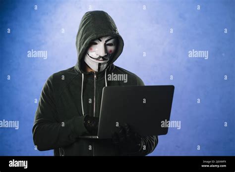 Hacker With Anonymous Mask High Quality Beautiful Photo Concept Stock