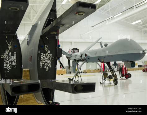 An Mq 9 Reaper Sits In A Hangar Prior To Having The Wings Put On At