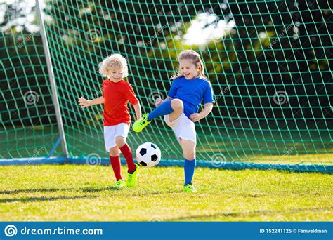 Kids Play Football. Child At Soccer Field Stock Image - Image of little ...