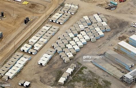 Equipment Stands At The Suncor Energy Inc Base Plant In This Aerial