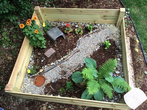 Outdoor Tortoise Enclosure Made Using Cedar Fence Boards All In With
