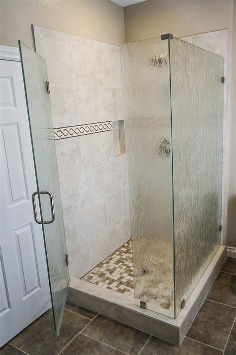 You have to decide whether you prefer pristine clarity through the shower walls at all times or require some privacy while you bathe. Barn door shower doors|shower bath glass doors | Fast Glass