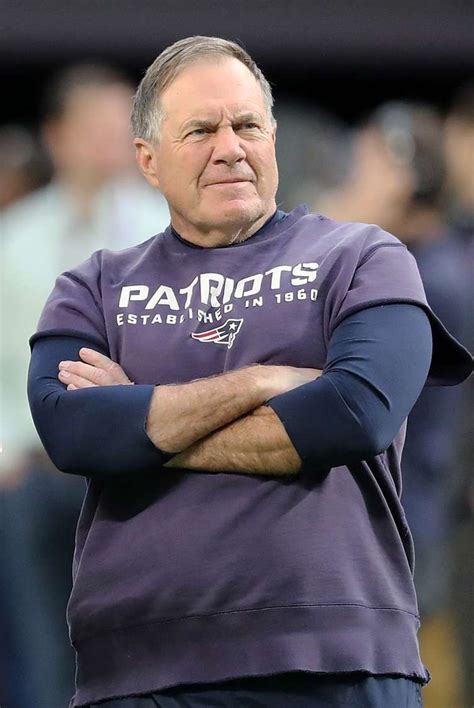 mature men of tv and films bill belichick in the rain today wet clothes