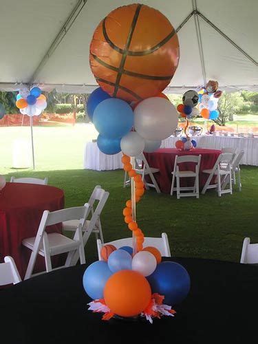 If you're hosting the shower, ask the expectant parents if there is a special team that they would like to highlight. sports themed baby shower | Sports Theme centerpiece ...