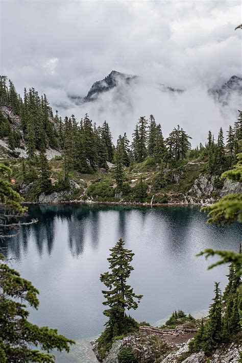 Mist And Fog Masks The Mountains Near Gem Lake Washington Photograph