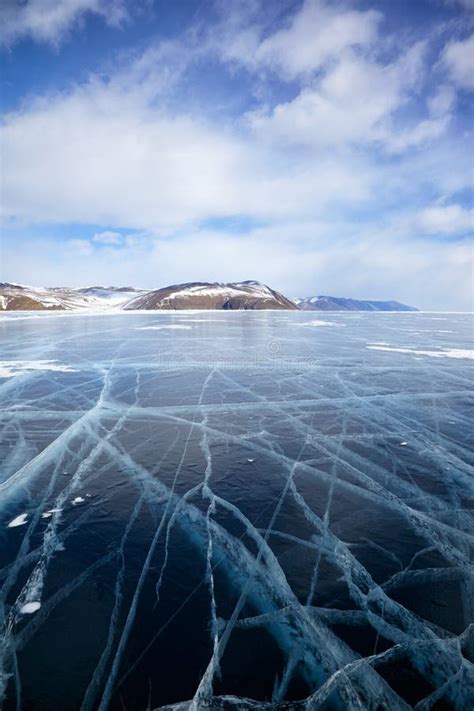 Winter Ice Landscape On Siberian Lake Baikal With Clouds Stock Photo