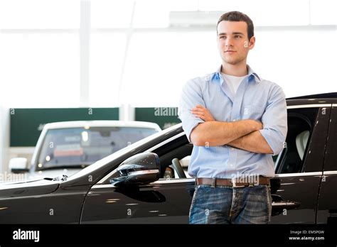 Man Standing Near A Car Stock Photo Alamy