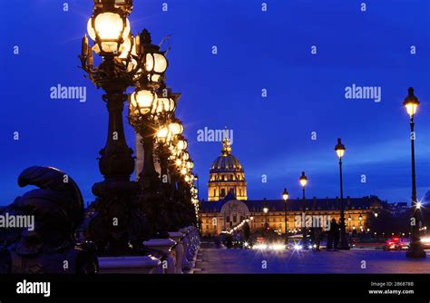 The Bonze Lamps On Famous Alexander Iii Bridge In Evening Paris Stock
