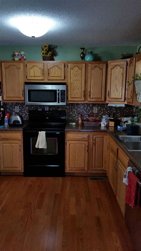 We would like to paint our kitchen cabinets.looking for advice on color. : HomeImprovement
