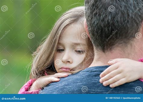 Portrait Of One Sad Daughter Hugging Her Father Stock Image Image Of
