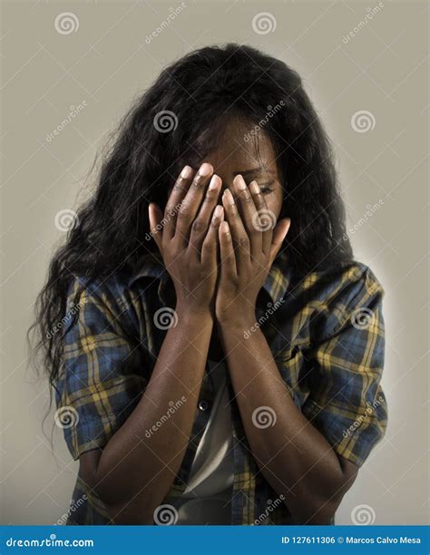 Young Sad And Depressed Black African American Woman Crying Anxious And Overwhelmed Feeling Sick