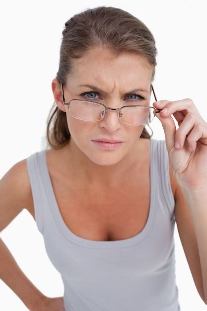 Premium Photo Portrait Of A Serious Woman With Glasses