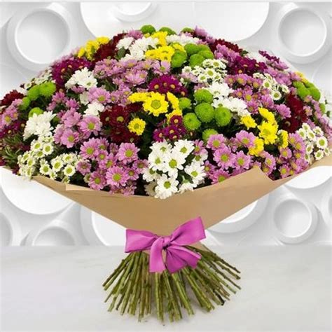 The bouquet depicted in the image is a representation of this floral style. Chrysanthemum bouquet Different color. Flower delivery