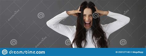 Beautiful Brunette Woman Yells Holding Her Head Stock Photo Image Of