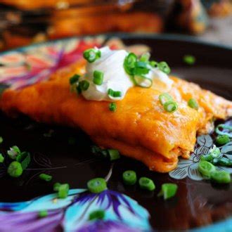 Celebrate cinco de mayo at home with this deliciously decadent and cheesy sour cream chicken enchilada recipe. Sour Cream Enchiladas | Recipe in 2020 | Sour cream ...