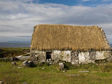 Derelict Thatched Cottage On The Aran Island Of Inishmore Ireland By