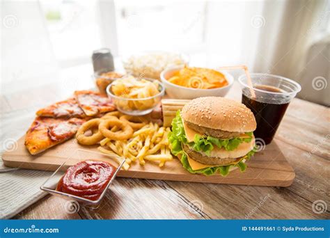 Close Up Of Fast Food And Cola Drink On Table Stock Image Image Of
