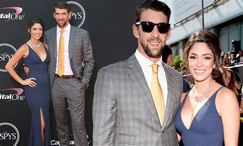 She also does work with the michael phelps foundation, which offers swimming instruction to kids who might otherwise not have that opportunity and promoted water safety. Michael Phelps and wife Nicole Johnson at ESPY Awards | Daily Mail Online