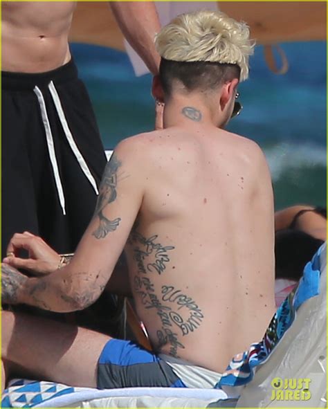 He used to lift his shirts at concerts so people could see it. Tokio Hotel's Tom & Bill Kaulitz Go Shirtless in Ibiza ...