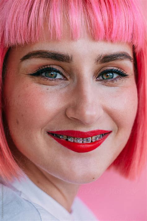 Closeup Portrait Of Smiling Girl With Braces And Beautiful Make Up