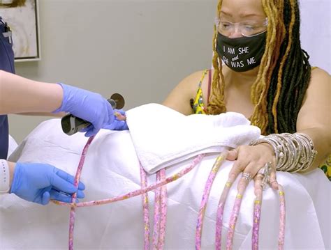 Watch The Woman With The Worlds Longest Nails Get Them Cut After 30