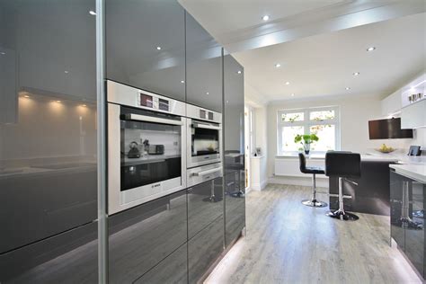 Modern White And Grey Acrylic Kitchen Design With Eye Level Bosch