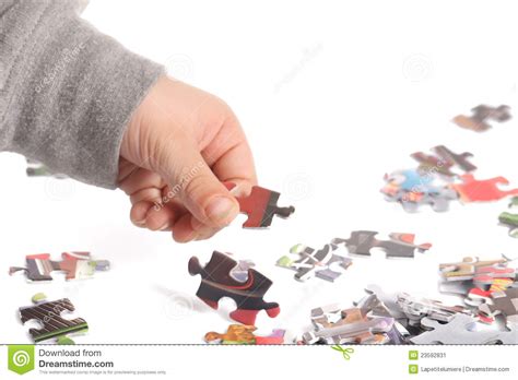 This toy can be played in. A Child Is Playing His Puzzle Stock Image - Image of ...