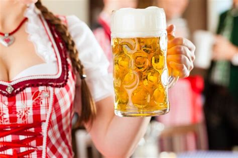 Premium Photo Young People In Traditional Bavarian Tracht In