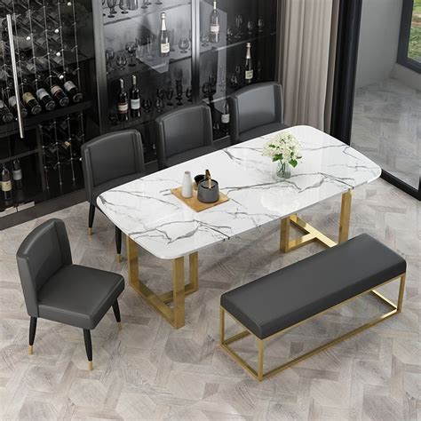 Modern dining table with a solid marble top in rectangular shape and neutral gray color. Modern Elegant Dining Table with Faux Marble Top & Metal ...
