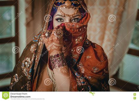Portrait Of A Beautiful Young Woman In Traditional Indian