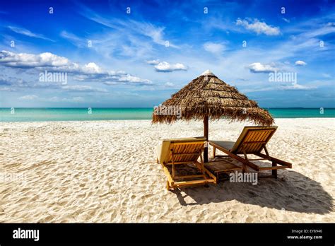 Vacation Holidays Background Wallpaper Two Beach Lounge Chairs Under