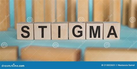 Stigma Word Written On Wooden Blocks On Light Blue Background Stock