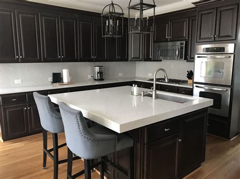 Triple ogee edge an amazing edge style that looks like a waterfall with three ogee layers. Kitchen is done! Mitered edge Statuarietto Quartz Island ...