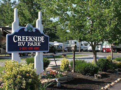 Deluxe camping cabins have an outside patio or deck with patio set and include microwave, mini fridge and tv. Creekside RV Park - Pigeon Forge campgrounds | Good Sam Club