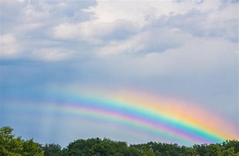 Premium Photo Blue Sky And Rainbow