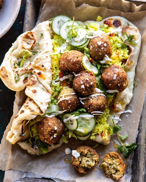 5 ingredient falafel, roasted veggies, and avocado sauce stuffed between pillowy garlic naan. Tieghan Gerard on Instagram: "Falafel Naan Wraps with ...